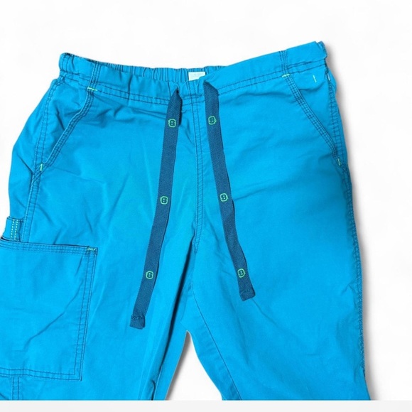 Spread Good Cheer! Teal/Blue Scrub bottoms size small - Picture 3 of 5
